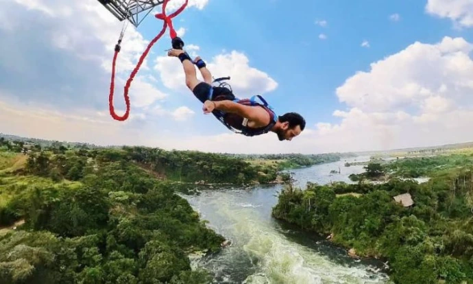 A man doing bungee jumping in Jinja