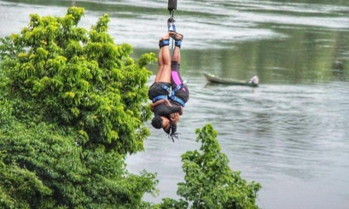 a couple doing bungee jumping in Jinja