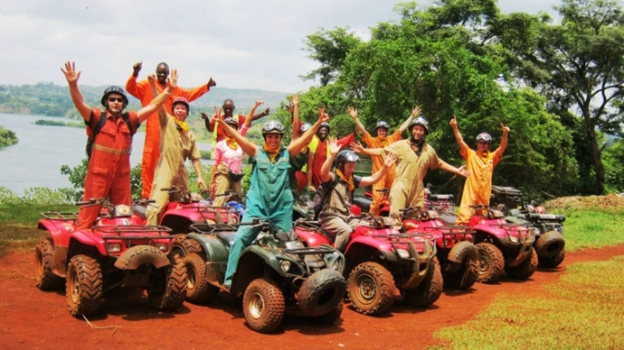 a group of tourists doing ready for quad biking in Jinja